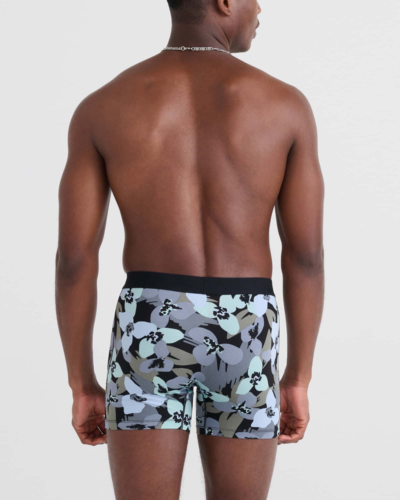 Back - Model wearing Daytripper Boxer Brief Fly in Camo Flowers- Blue Fog