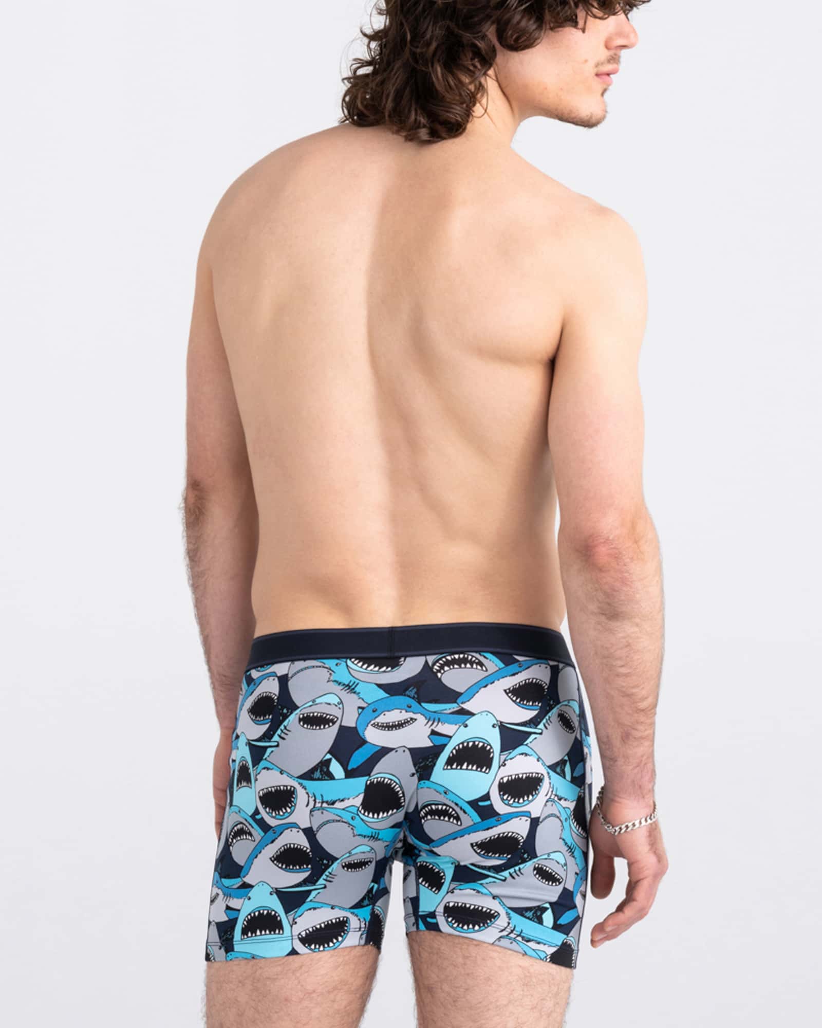 Back - Model wearing Daytripper Boxer Brief Fly in Shark Tank Camo- Navy