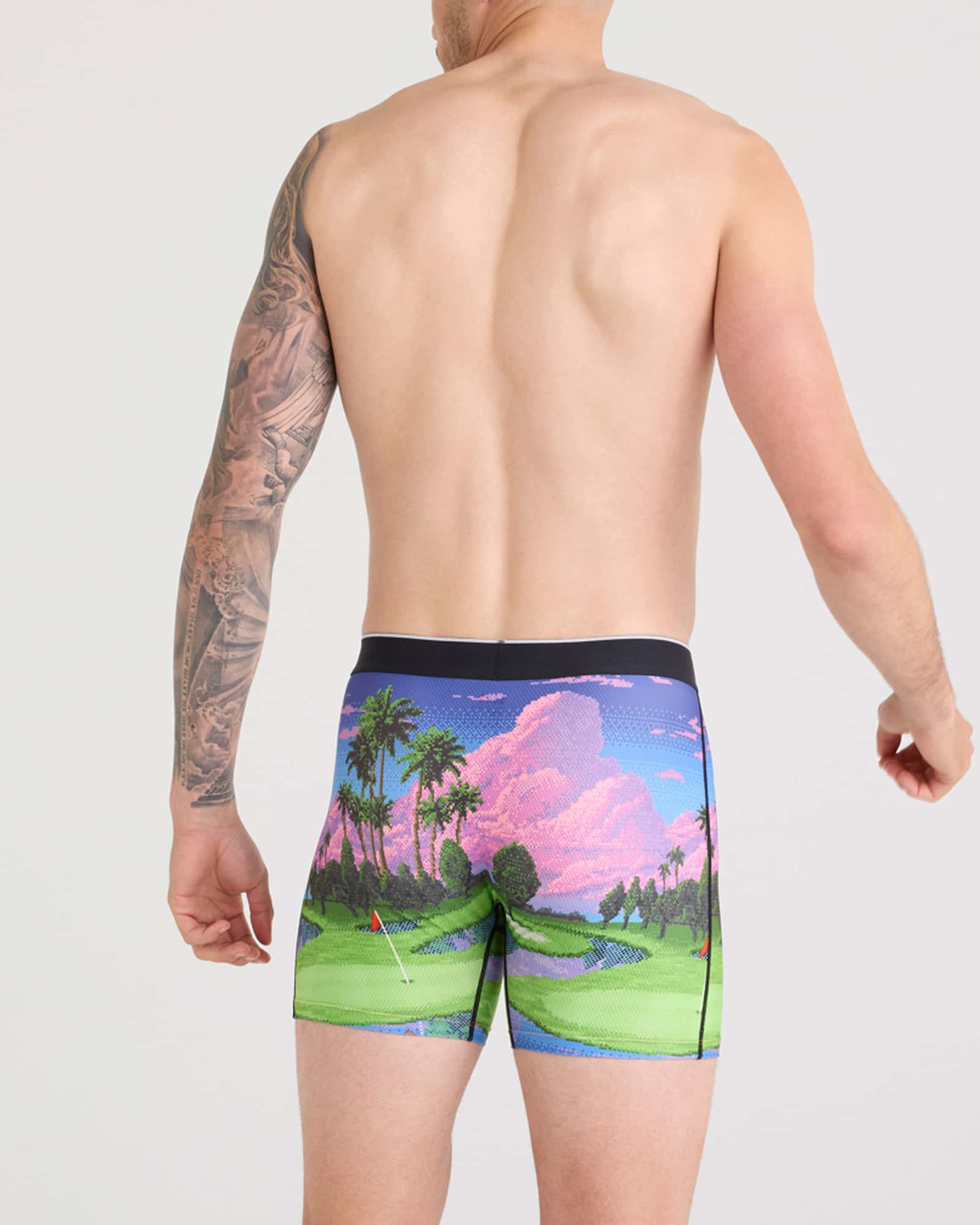 Back - Model wearing Volt Breathable Mesh Boxer Brief in Pixel Paradise-Multi