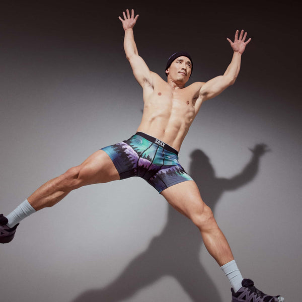 Model posing in Volt Breathable Mesh Boxer Brief in Yukon And Beyond-Multi