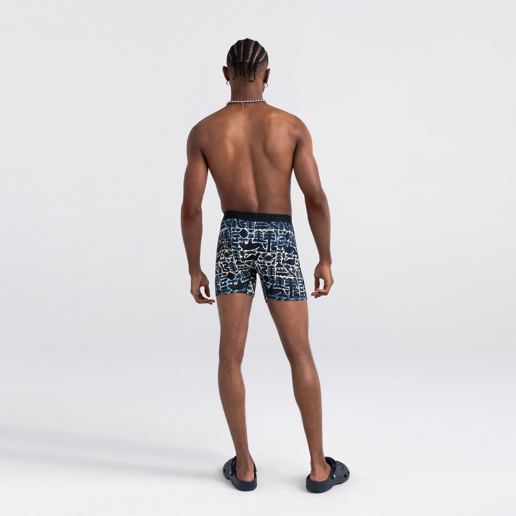 Back - Model wearing Ultra Super Soft Boxer Brief in Coast Life- Navy
