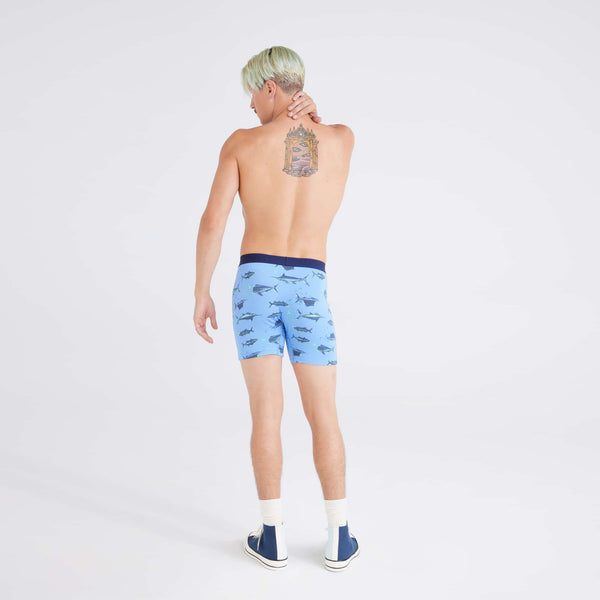 Back - Model wearing Ultra Super Soft Boxer Brief in Fish On-Sail Blue