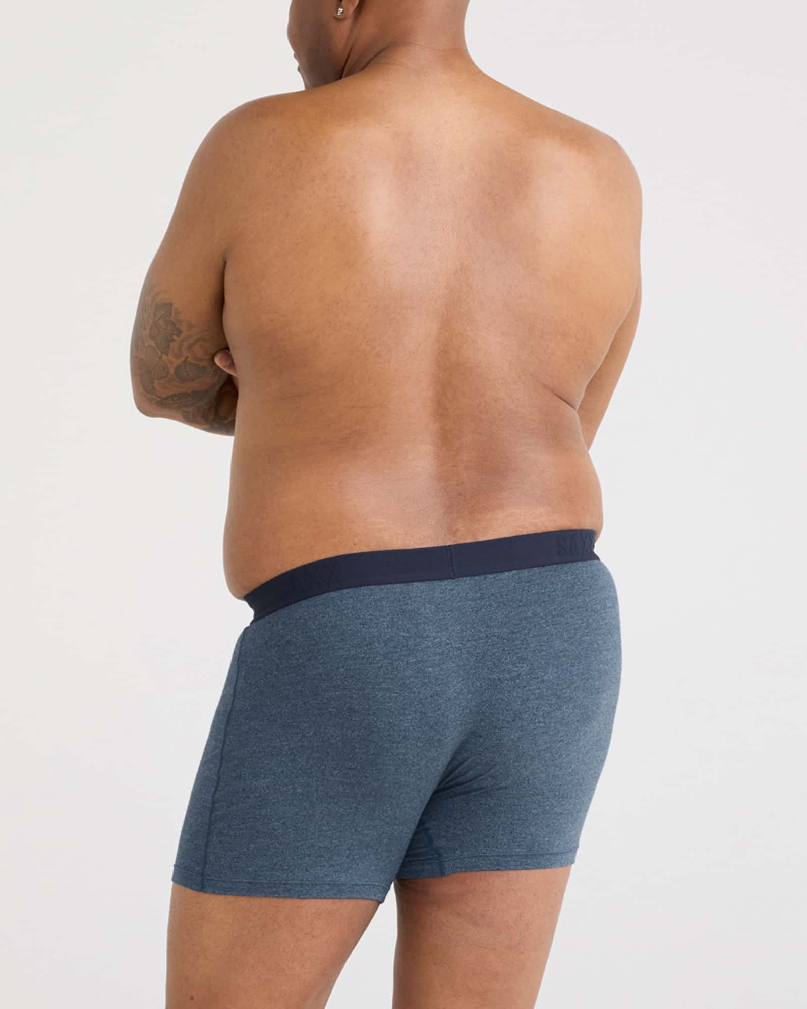 Back - Model wearing Ultra Super Soft Boxer Brief Fly in Indigo