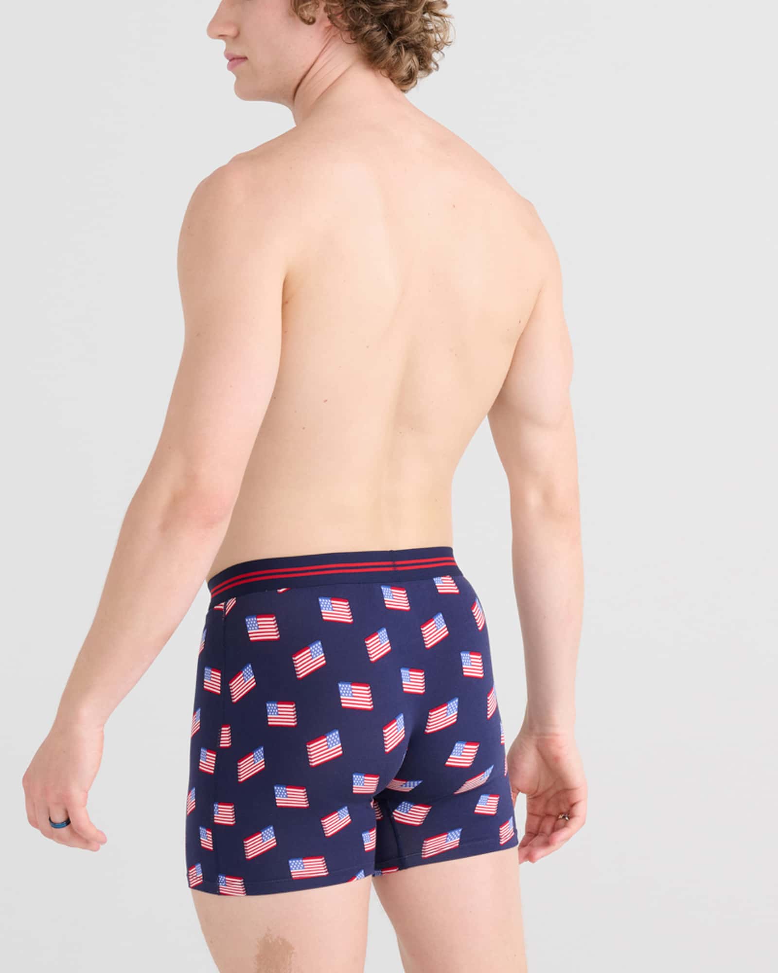 Back - Model wearing Ultra Super Soft Boxer Brief Fly in Stars And Stripes- Navy