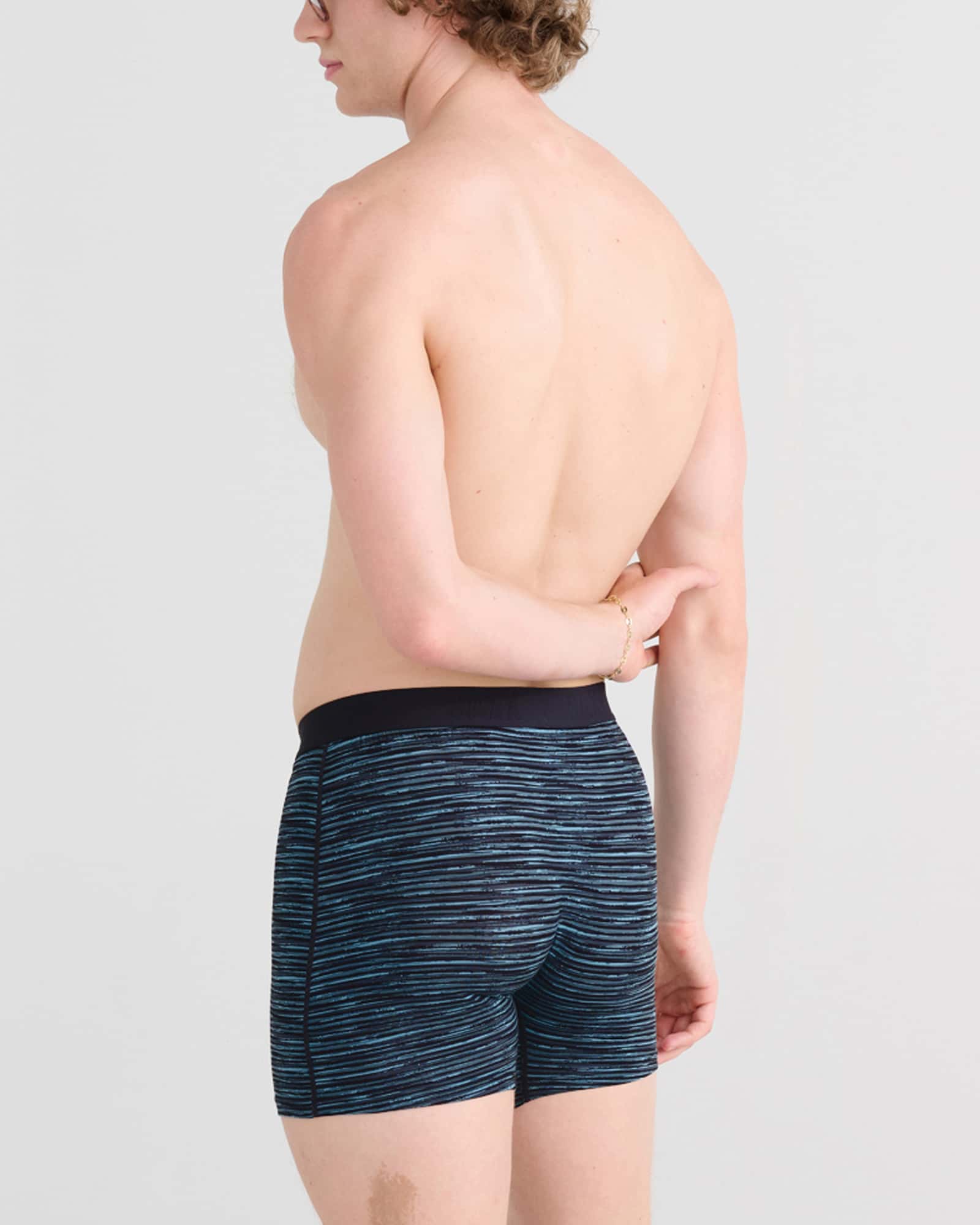 Back - Model wearing Ultra Super Soft Boxer Brief Fly in Spacedye Stripe-Grey Multi