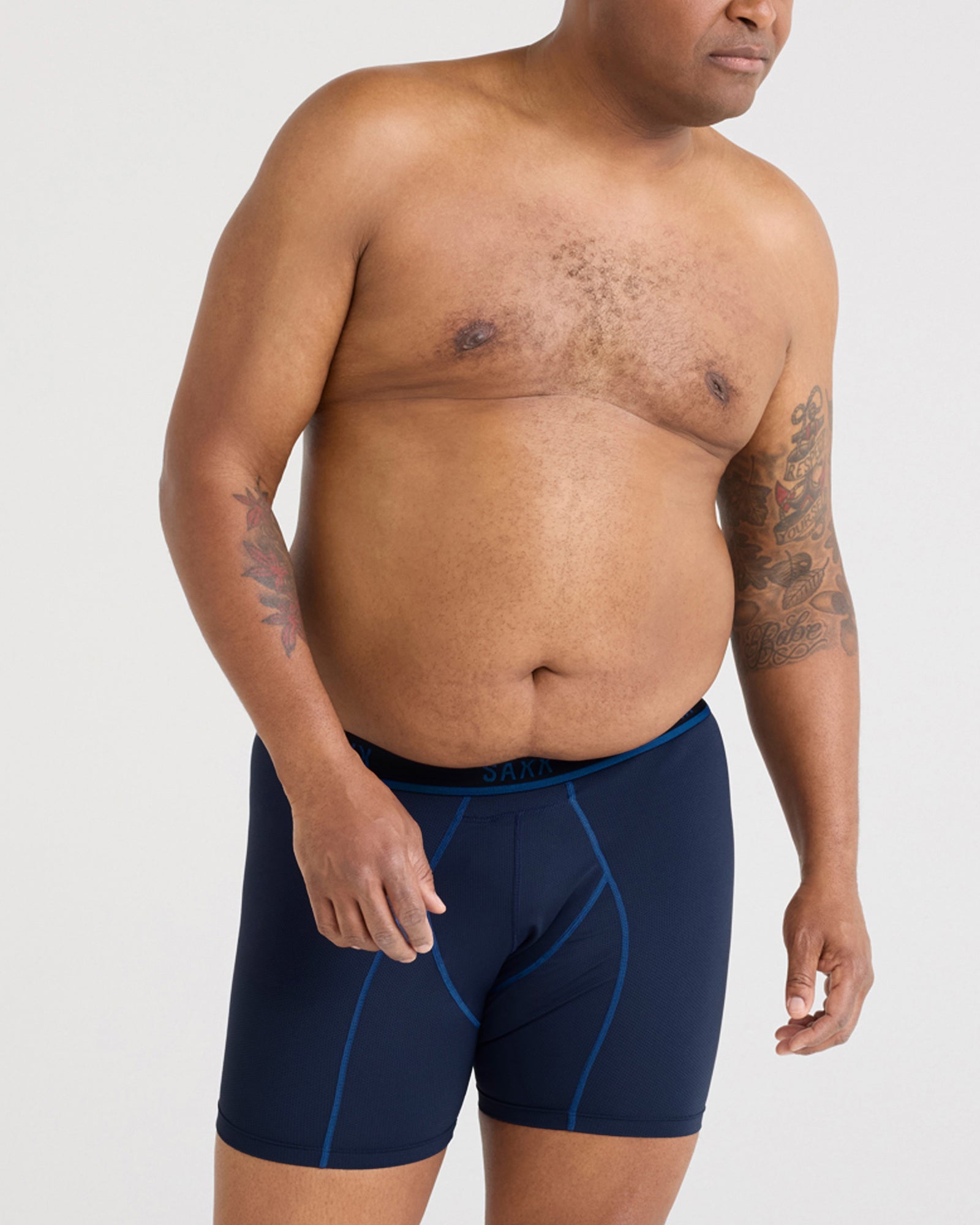 Front - Model wearing Kinetic Light-Compression Mesh Boxer Brief in Navy/City Blue