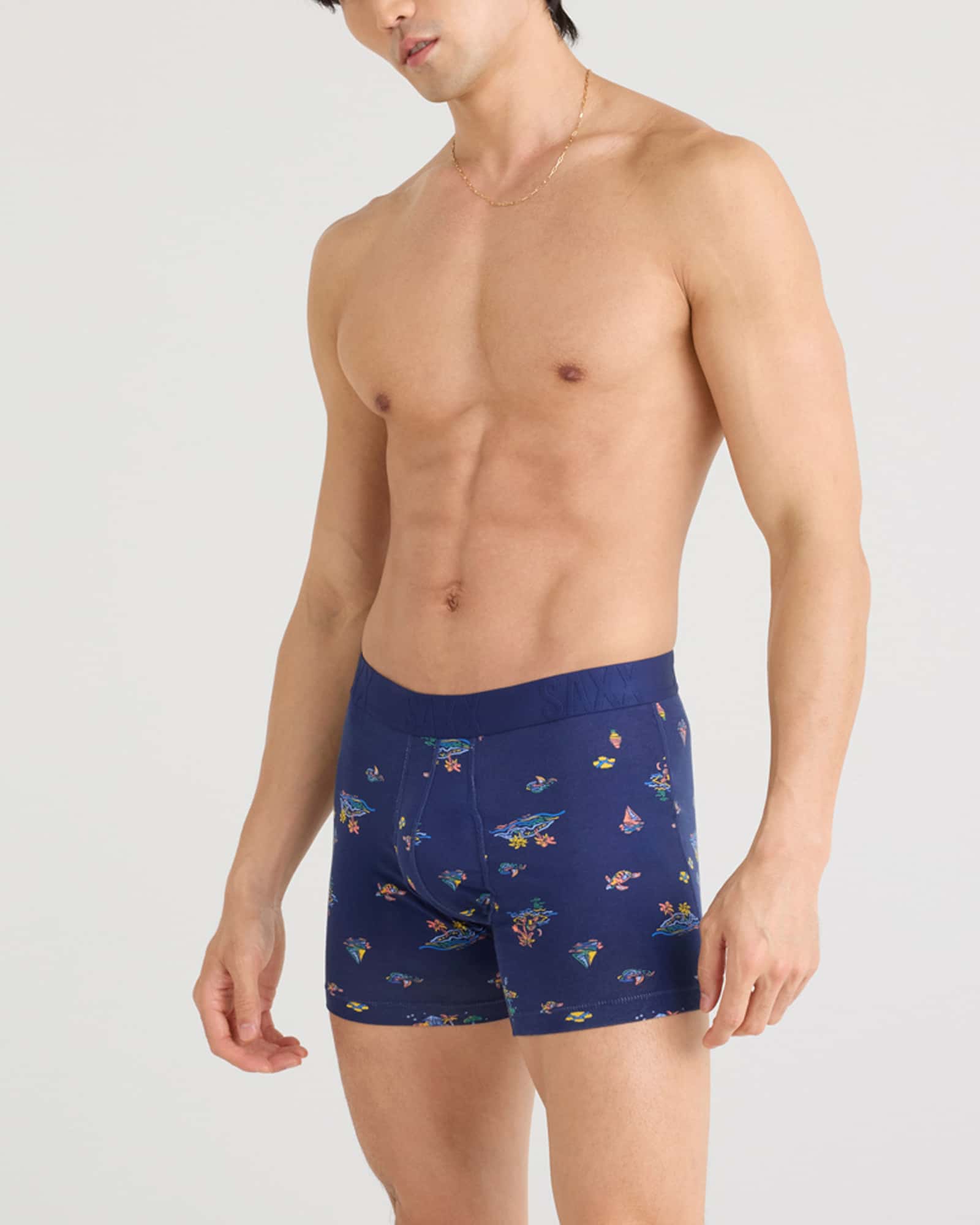 Front - Model wearing Droptemp Cooling Cotton Boxer Brief Fly in Island Life-Midnight