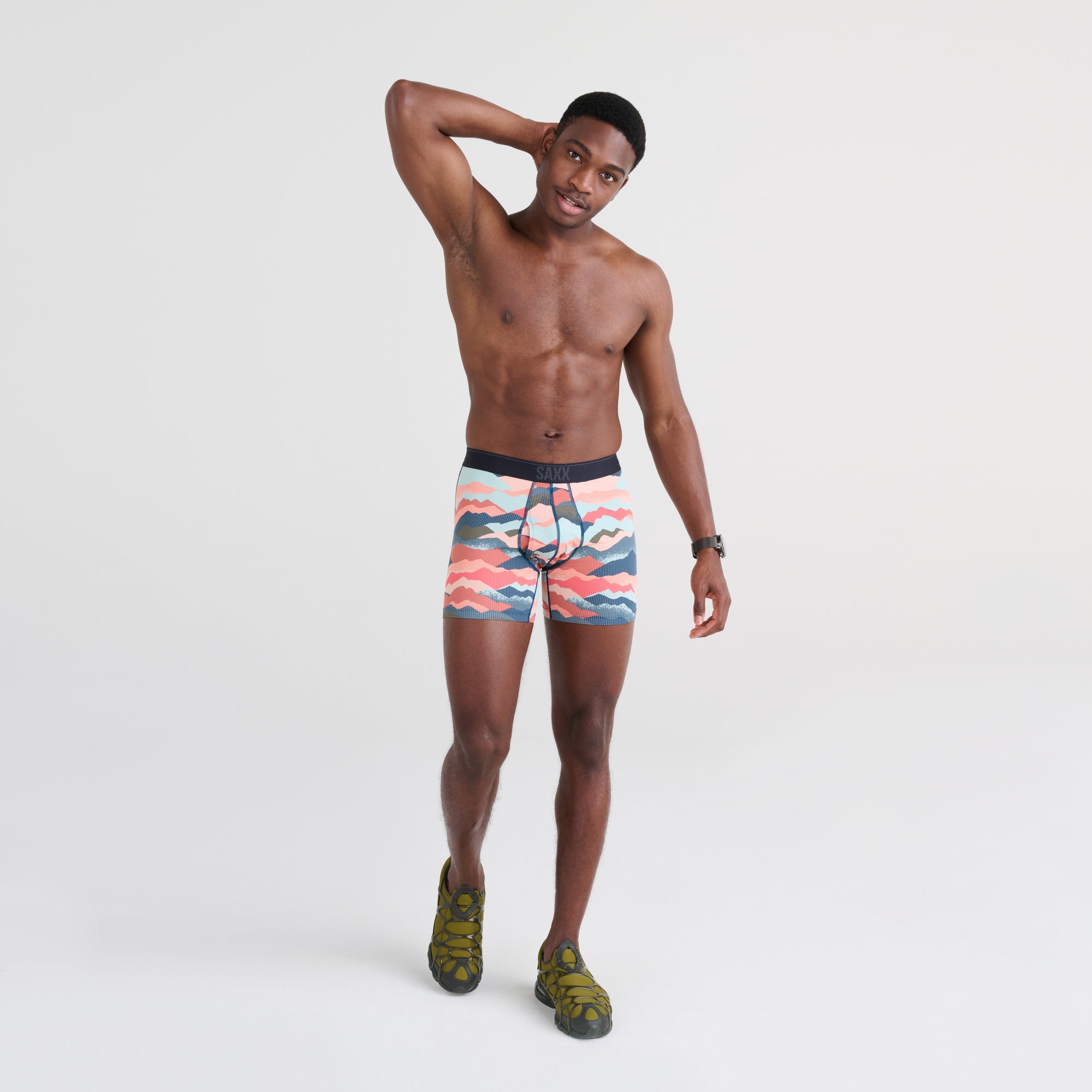 Front - Model wearing Quest Boxer Brief 5-Pack in Assorted Prints