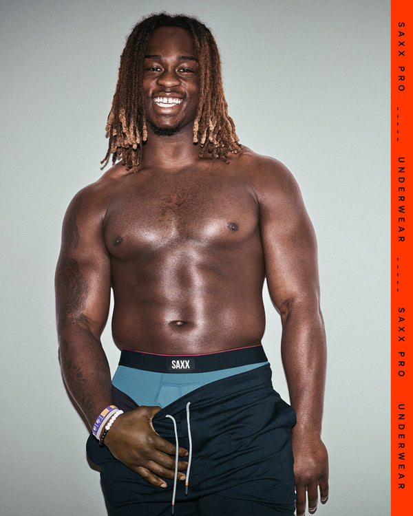 SAXX Gamechanger and College Football Player Ashton Jeanty in Multi-Sport Mesh Boxer Brief in Hydro Blue
