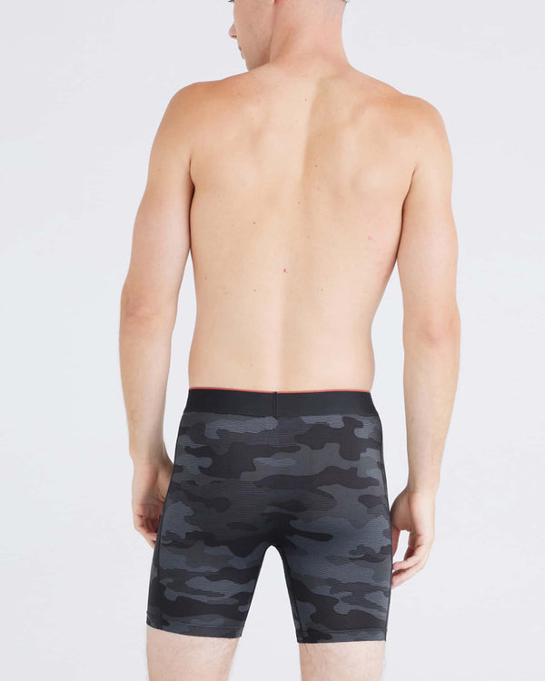 Back - Model wearing Multi-Sport Mesh Boxer Brief Fly in Remote Camo- Faded Black