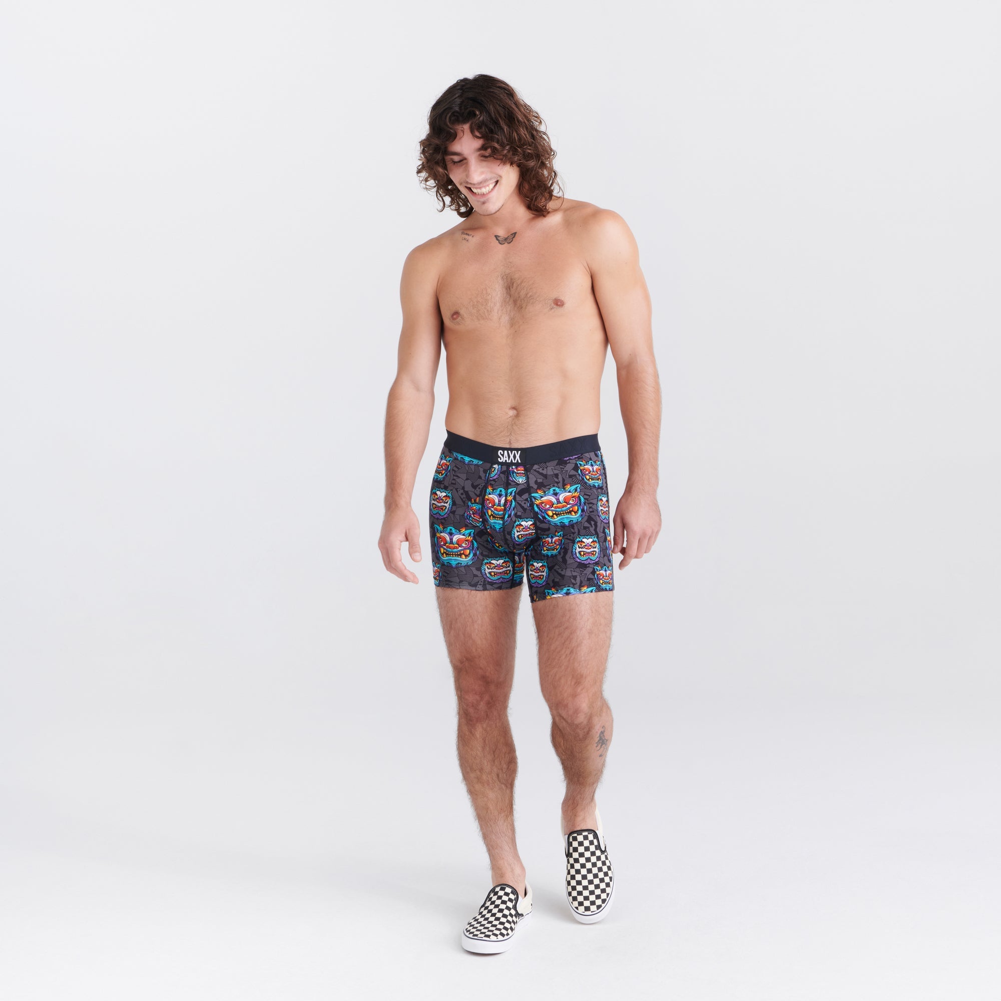 Front - Model wearing Vibe Super Soft Boxer Brief in Year Of The Dragon- Multi