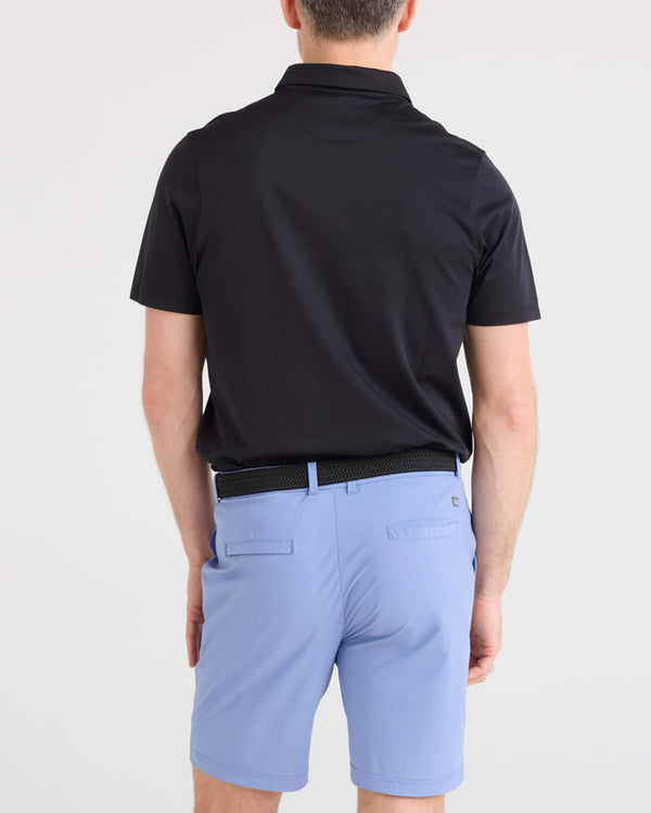 Back - Model wearing Droptemp Dry Polo in Black