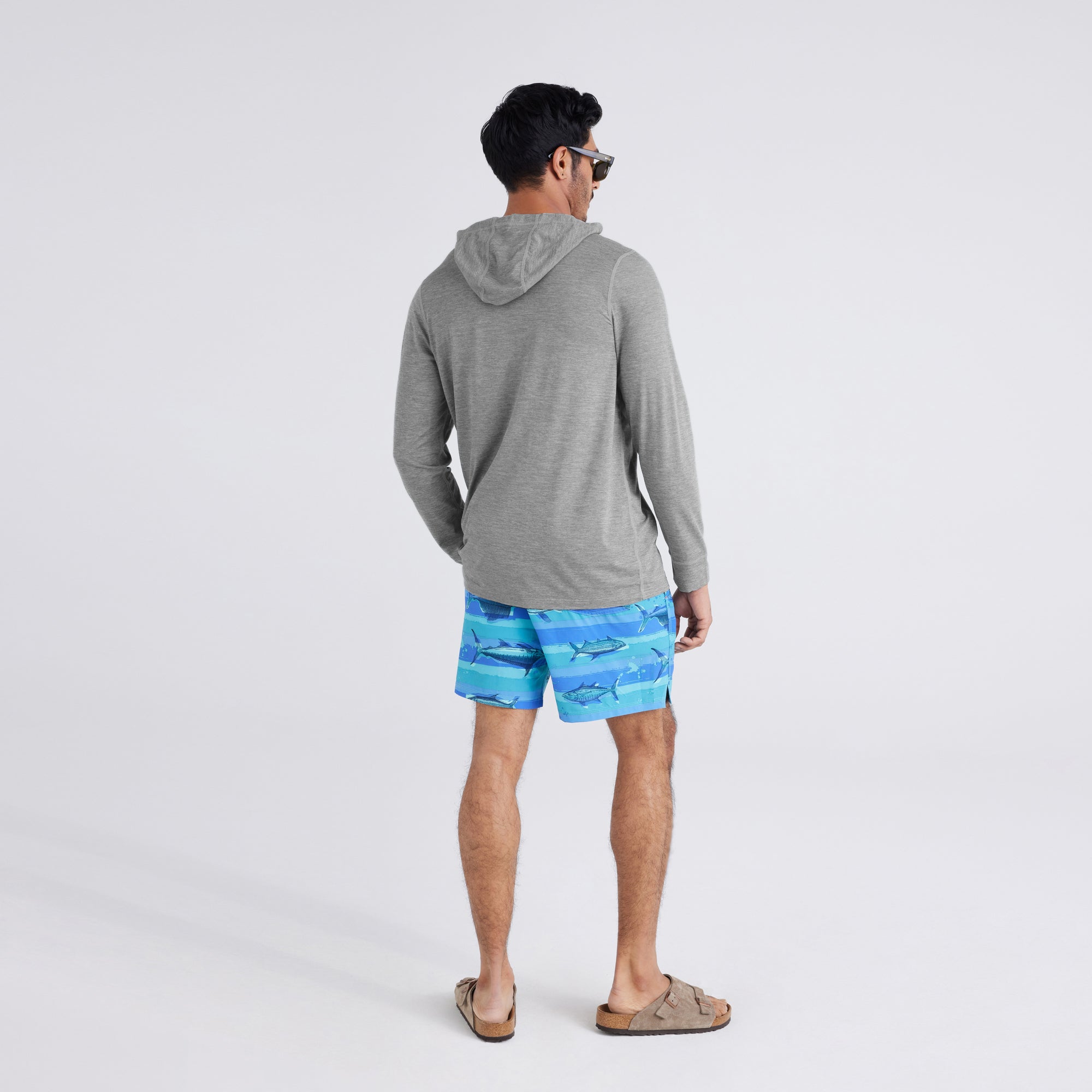 Back - Model wearing  Droptemp® All Day Cooling Hoodie in Tradewinds Heather