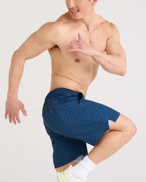 Front - Model wearing Multi-Sport 2N1 Short 7" in Ikat Check-Navy