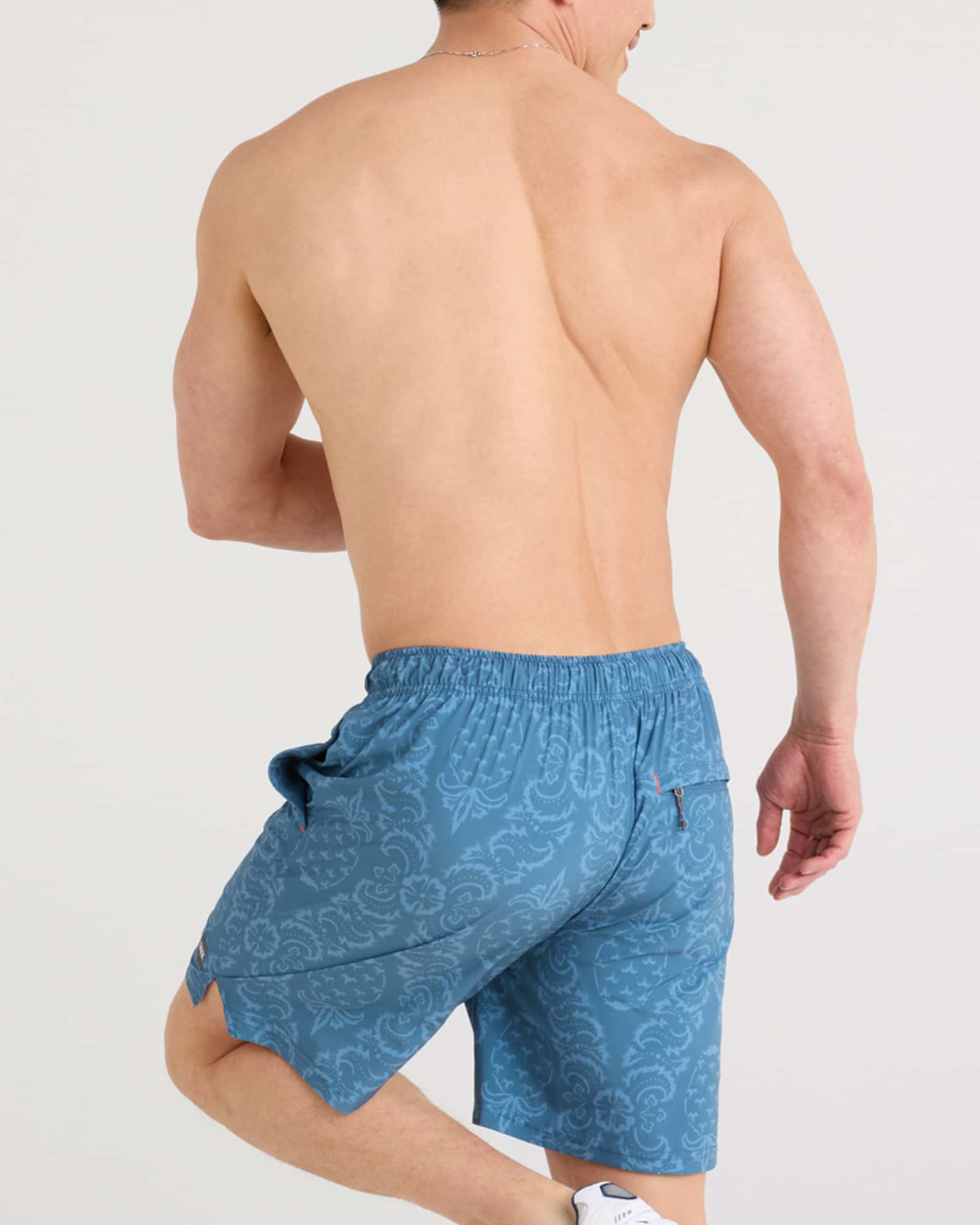 Back - Model wearing Multi-Sport 2N1 Short 7" in Pineapple Brocade-Tapestry