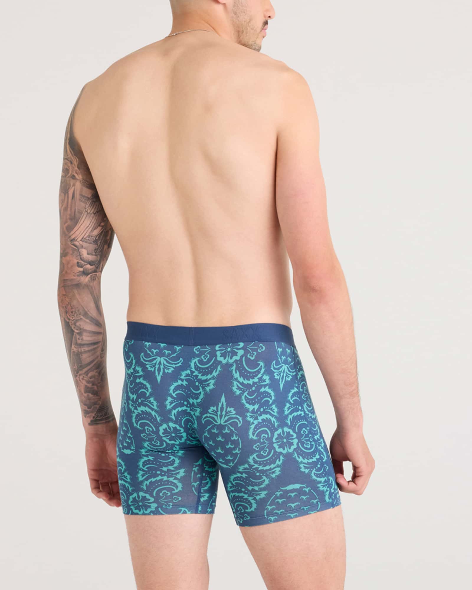 Back - Model wearing Vibe Xtra Boxer Brief Fly 2 Pack in Pineapple Brocade/Black