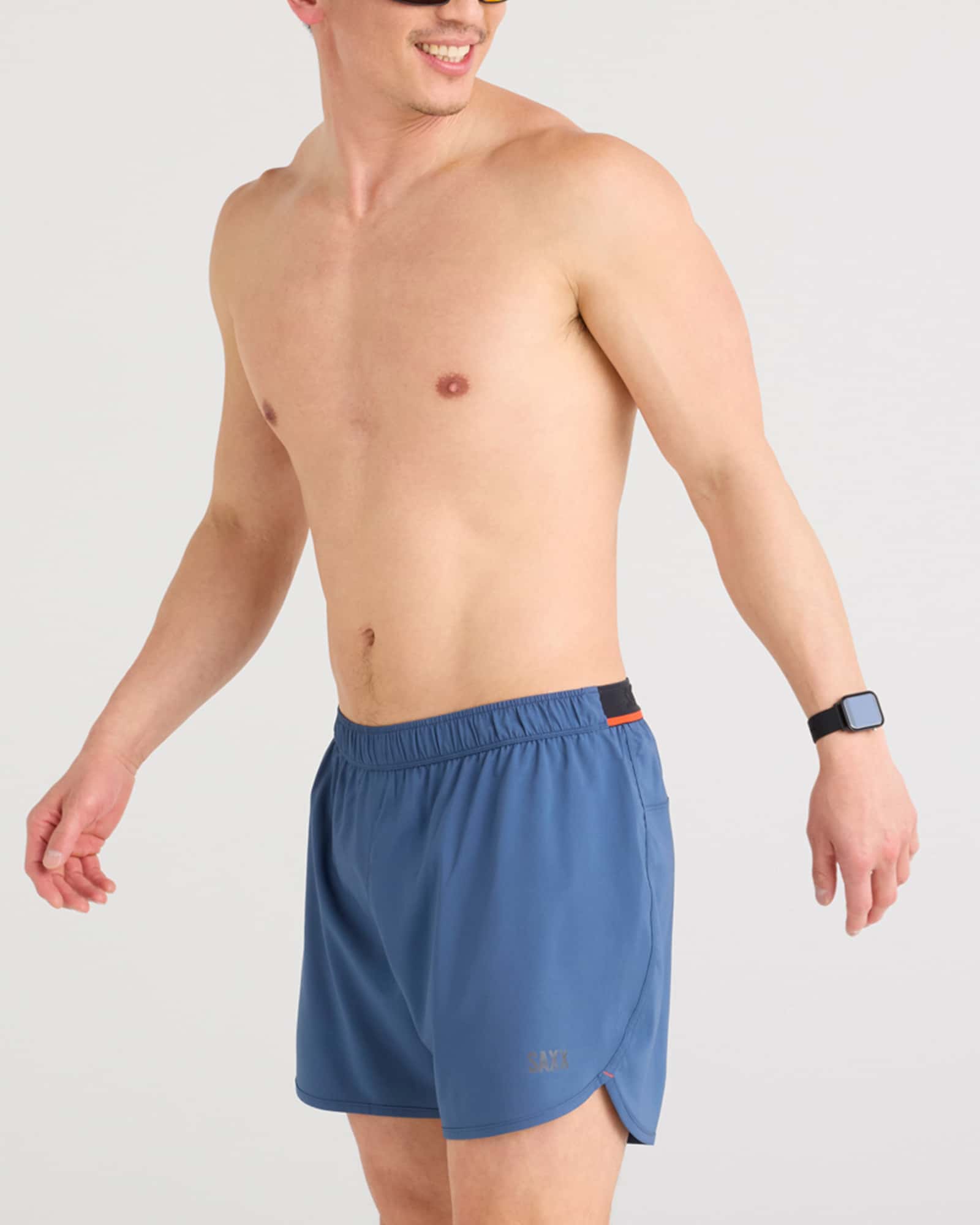 Front - Model wearing Hightail 2N1 Run Short 5" in Dark Denim