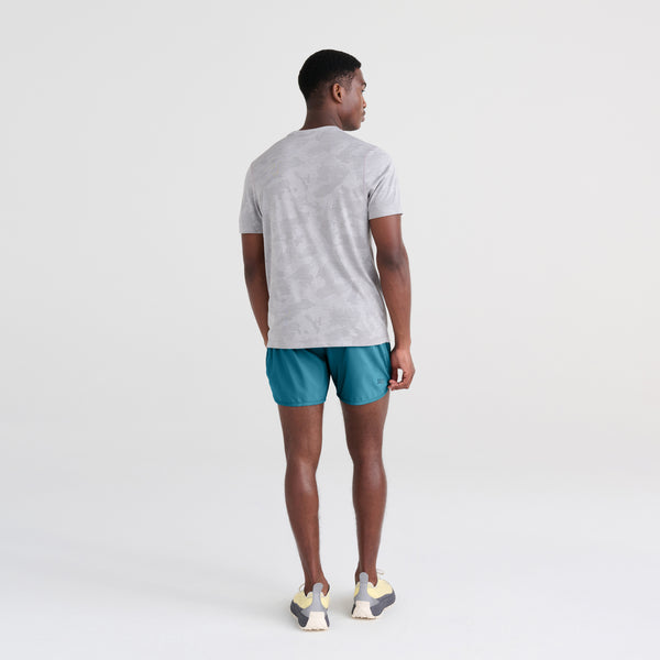 Back - Model wearing Hightail 2N1 Short Trunk in Hydro Blue