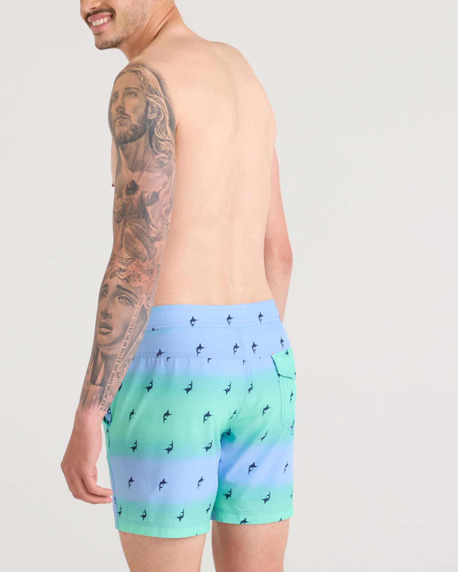 Back - Model wearing Betawave 2N1 Swim Board Short 17" in Sailfish Ombre-Multi