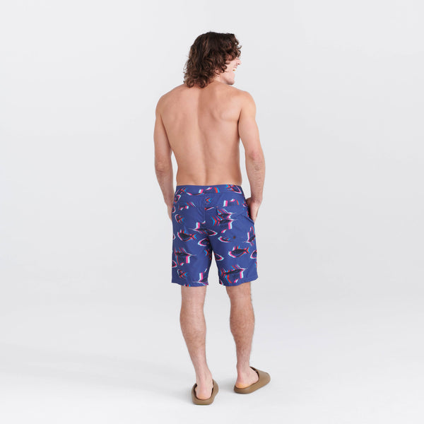 Back - Model wearing Betawave 2N1 Swim Board Short Long in Scaled Up- Deep Cobalt