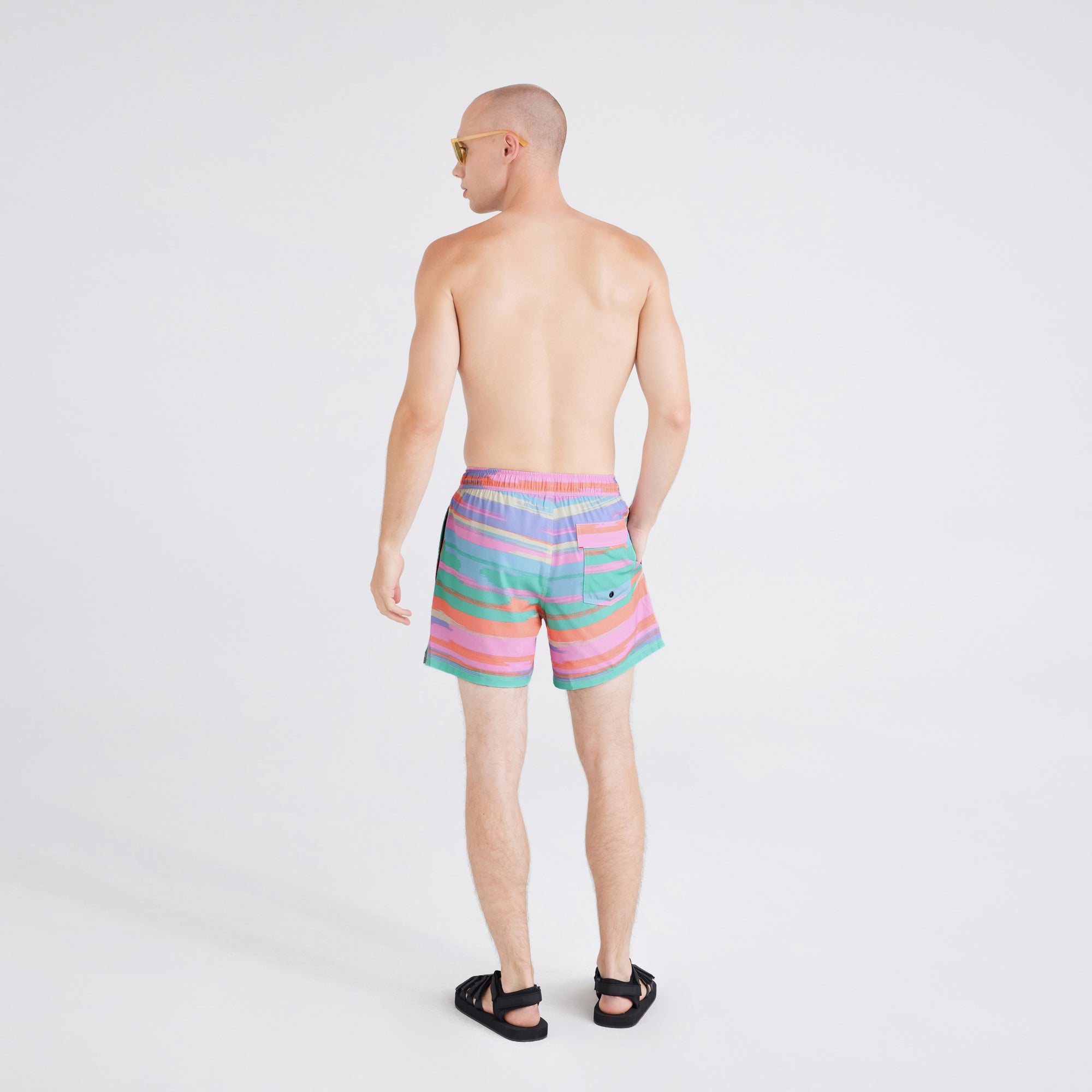 Back - Model wearing  Oh Buoy 2N1 Swim Short Trunk in Abstract Stripe-Multi