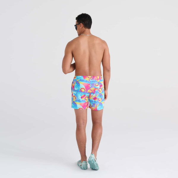 Back - Model wearing Oh Buoy 2N1 Swim Trunk 5" in Coast 2 Coast- Blue Multi