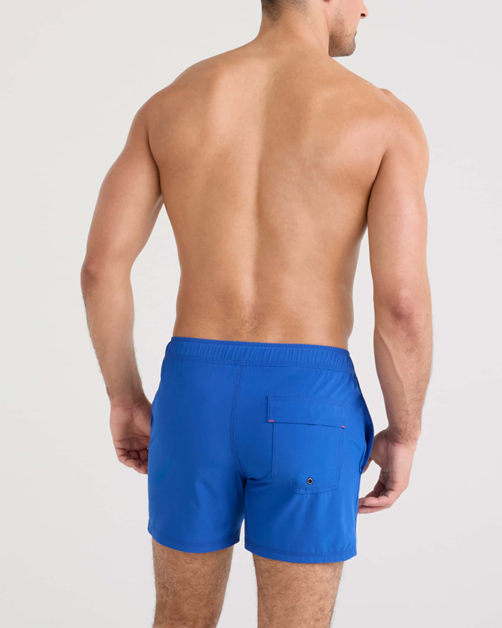 Back - Model wearing Oh Buoy 2N1 Swim Volley 5" in Cobalt