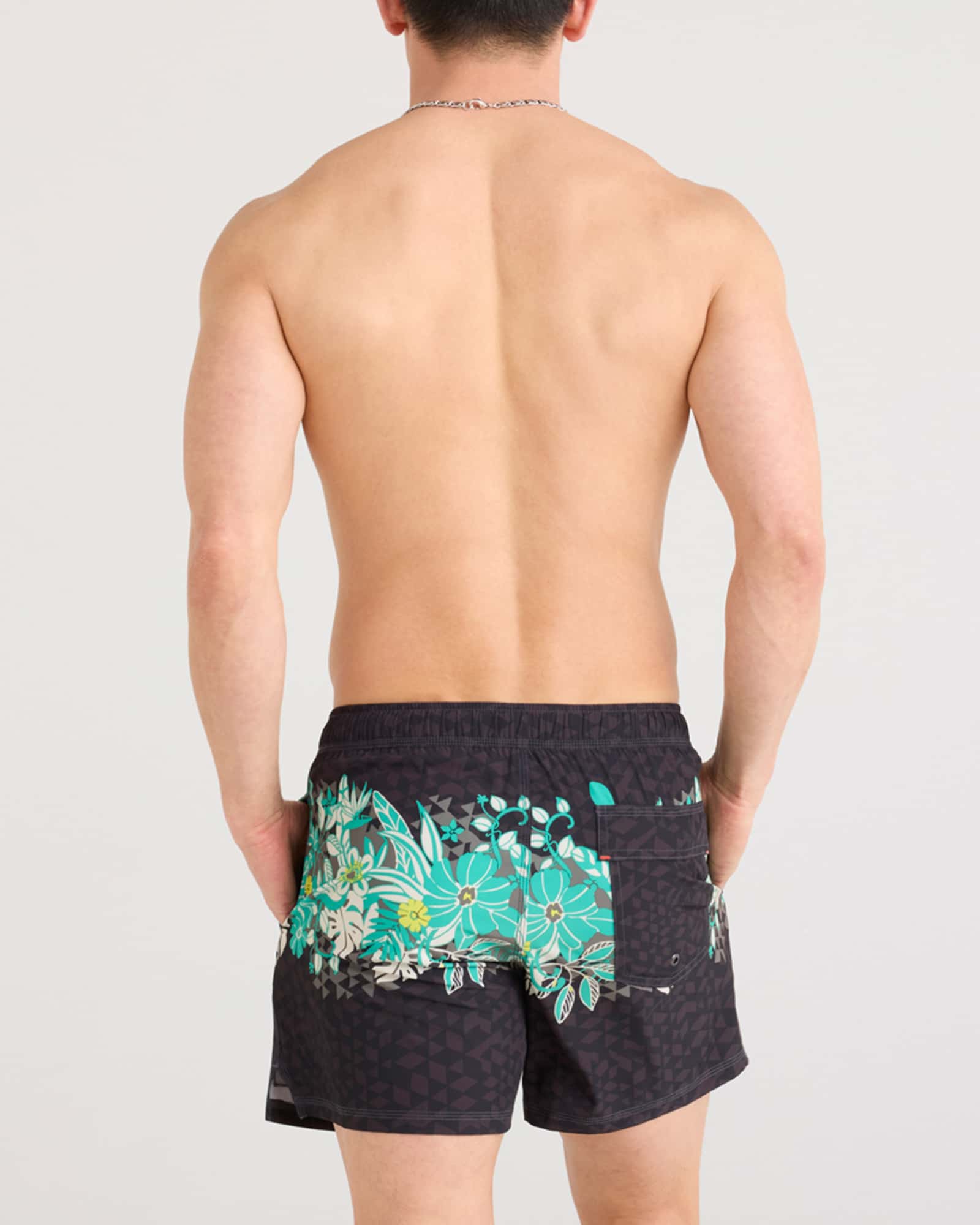 Back - Model wearing Oh Buoy 2N1 Swim Volley 5" in Diamondhead-Black