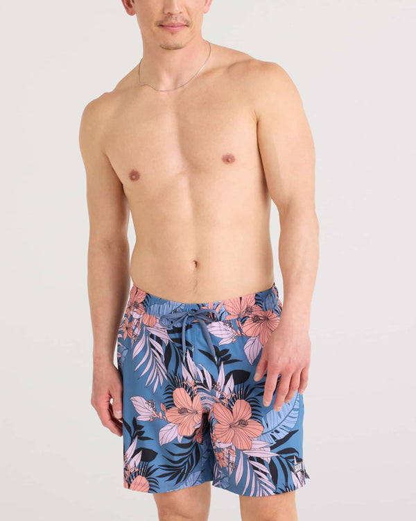 Front - Model wearing Oh Buoy 2N1 Swim Short in Hibiscus Jungle-Blue