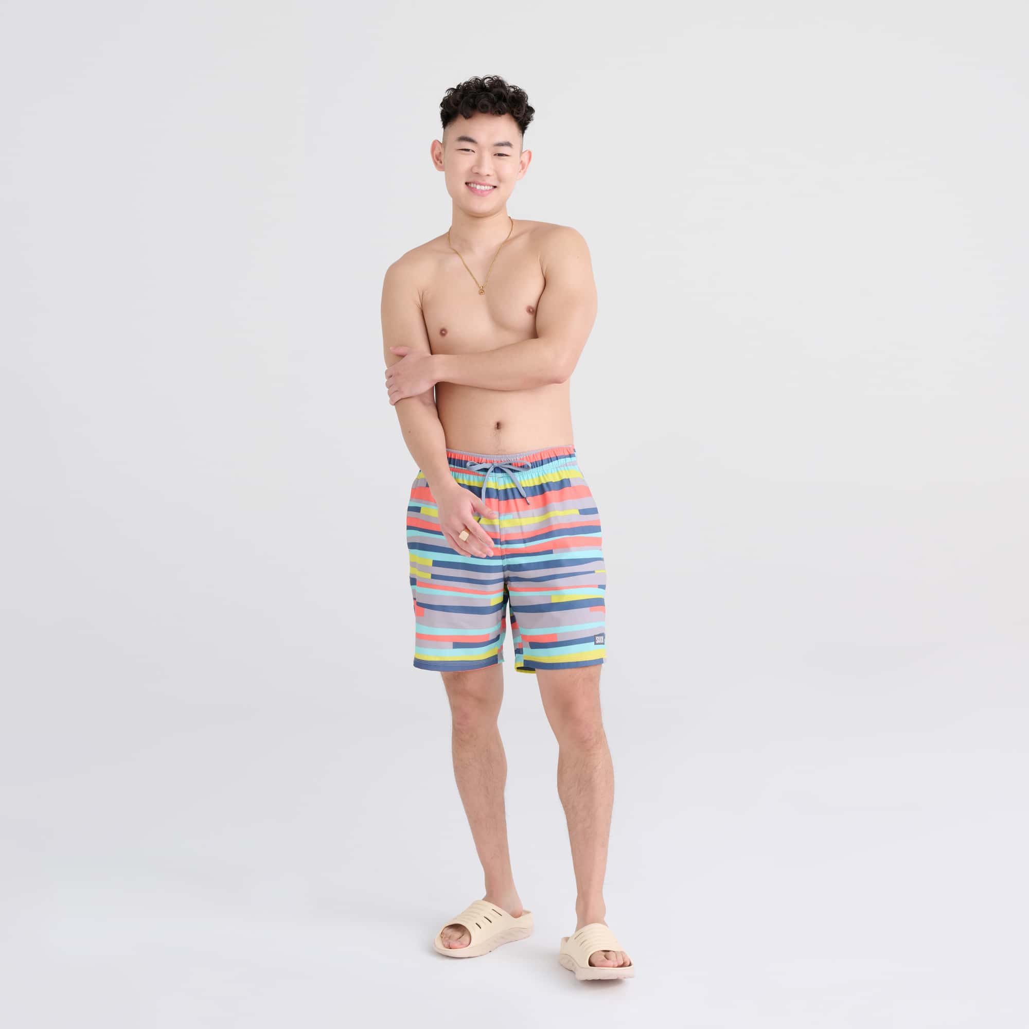 Front - Model wearing Oh Buoy 2N1 Swim Trunk 7" in Improv Stripe-Alloy Multi