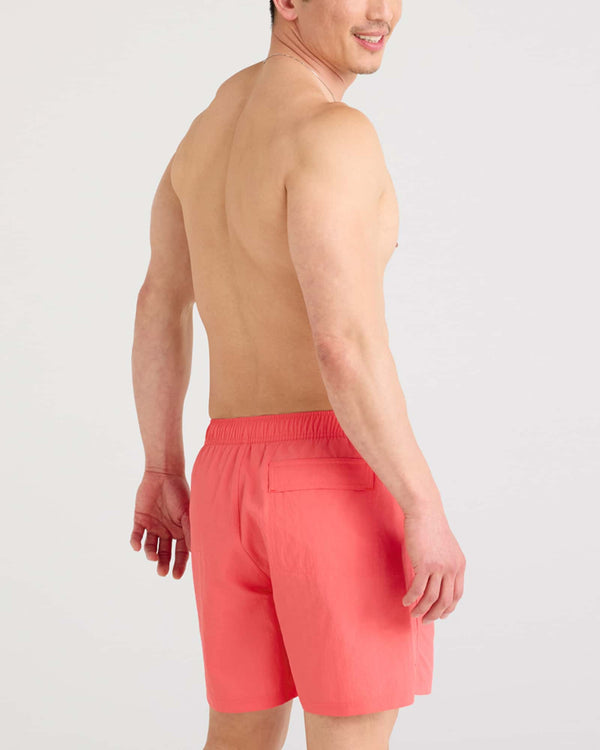 Back - Model wearing Go Coastal 2N1 Volley 5" in Coral Pop