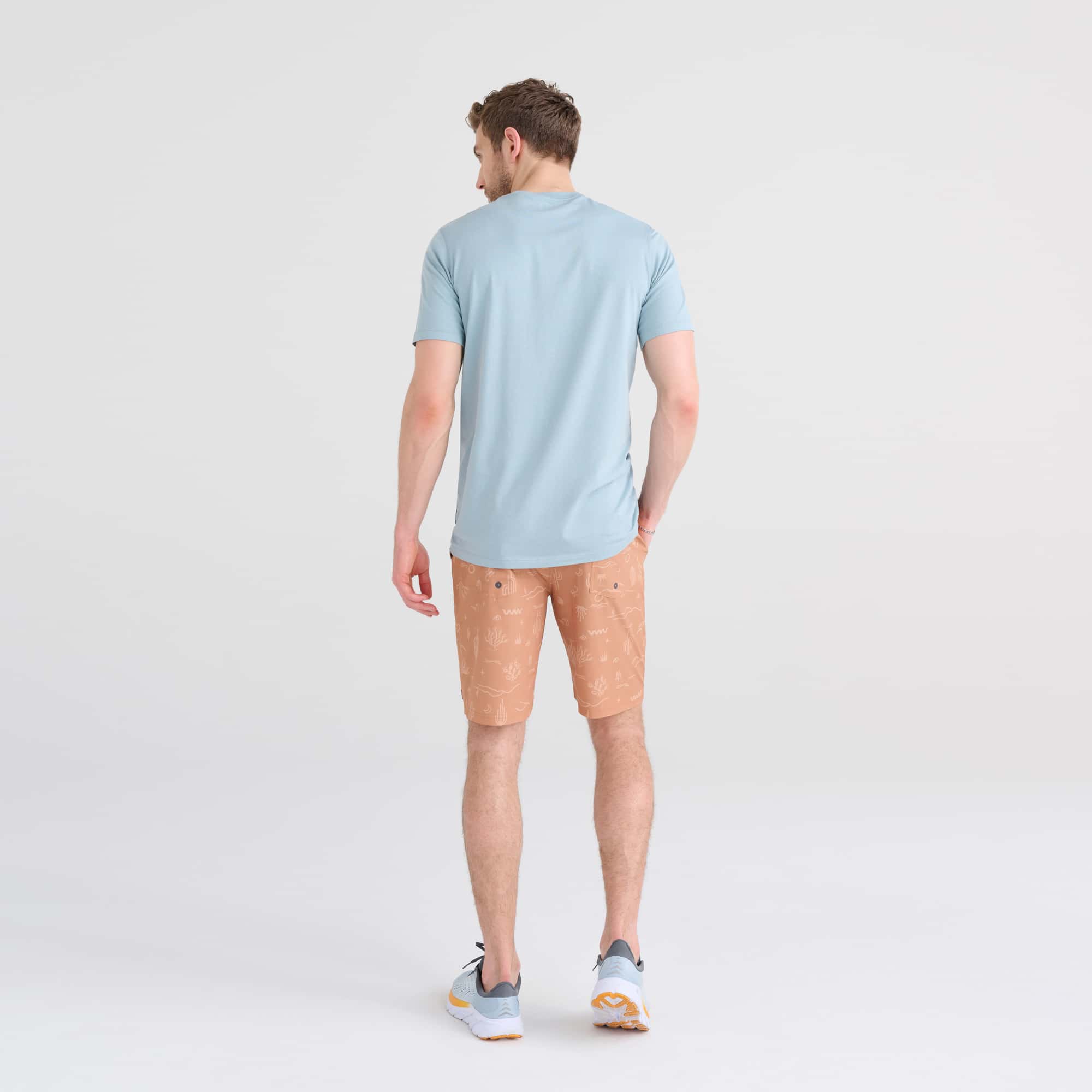 Back - Model wearing DropTemp Cooling Cotton Short Sleeve Crew in Clay Blue