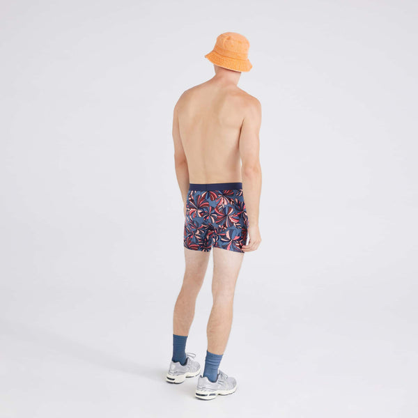 Back - Model wearing Vibe Xtra Boxer Brief in Flower Pop-Stone Blue