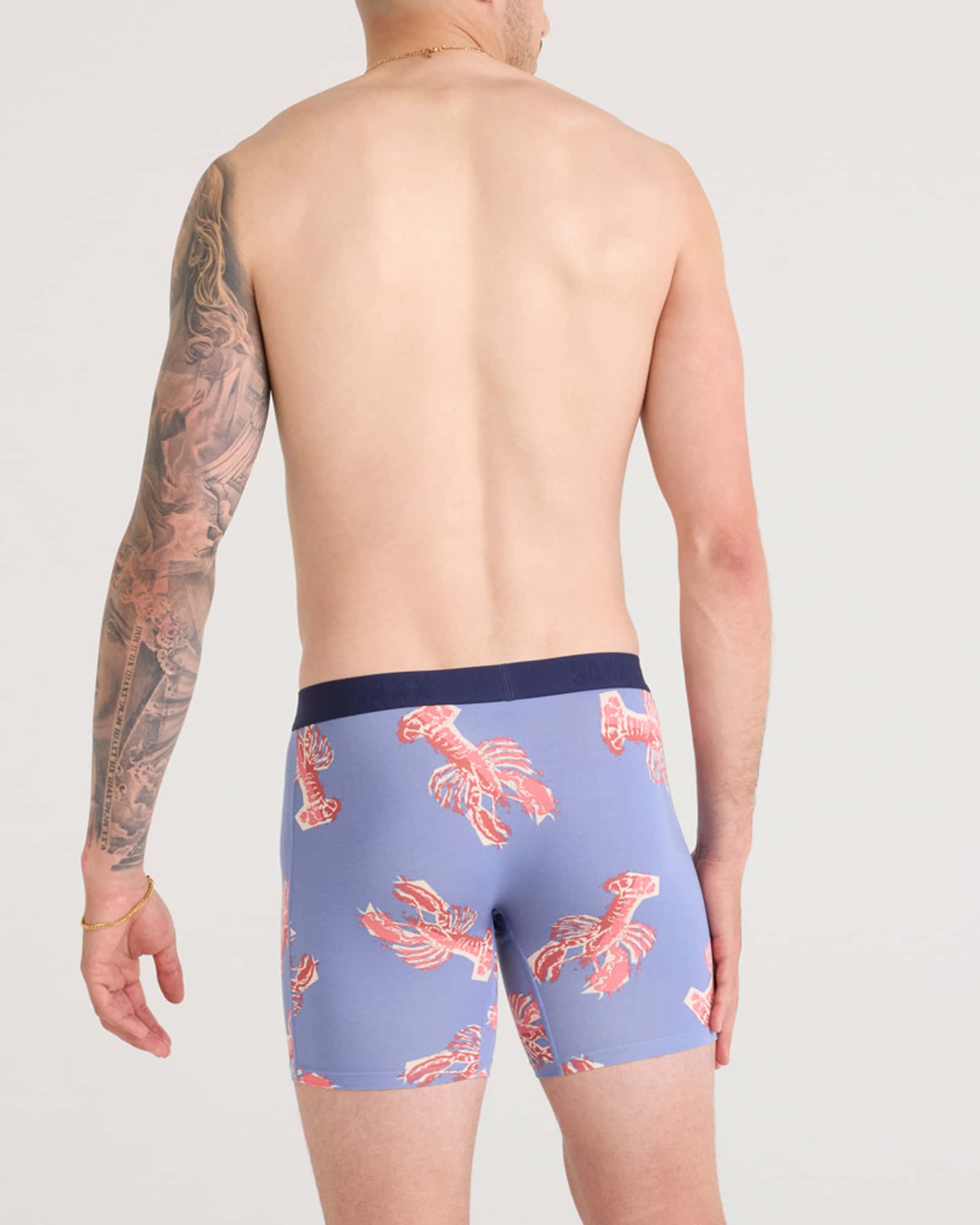 Back - Model wearing Vibe Xtra Boxer Brief Fly in Lobster Boil-Tidal Blue