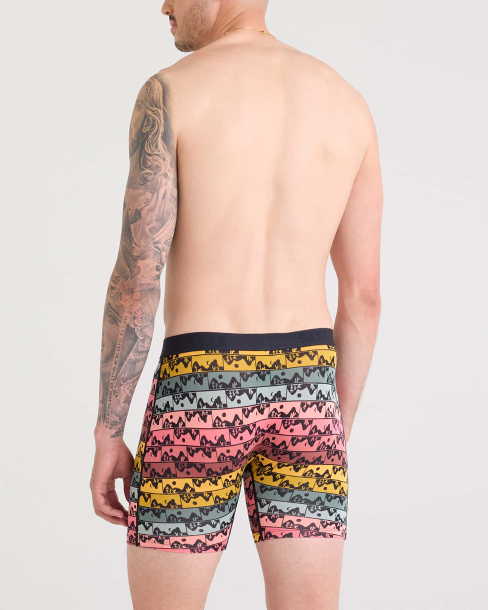 Back - Model wearing Vibe Xtra Boxer Brief Fly in Mesa Grid-Multi