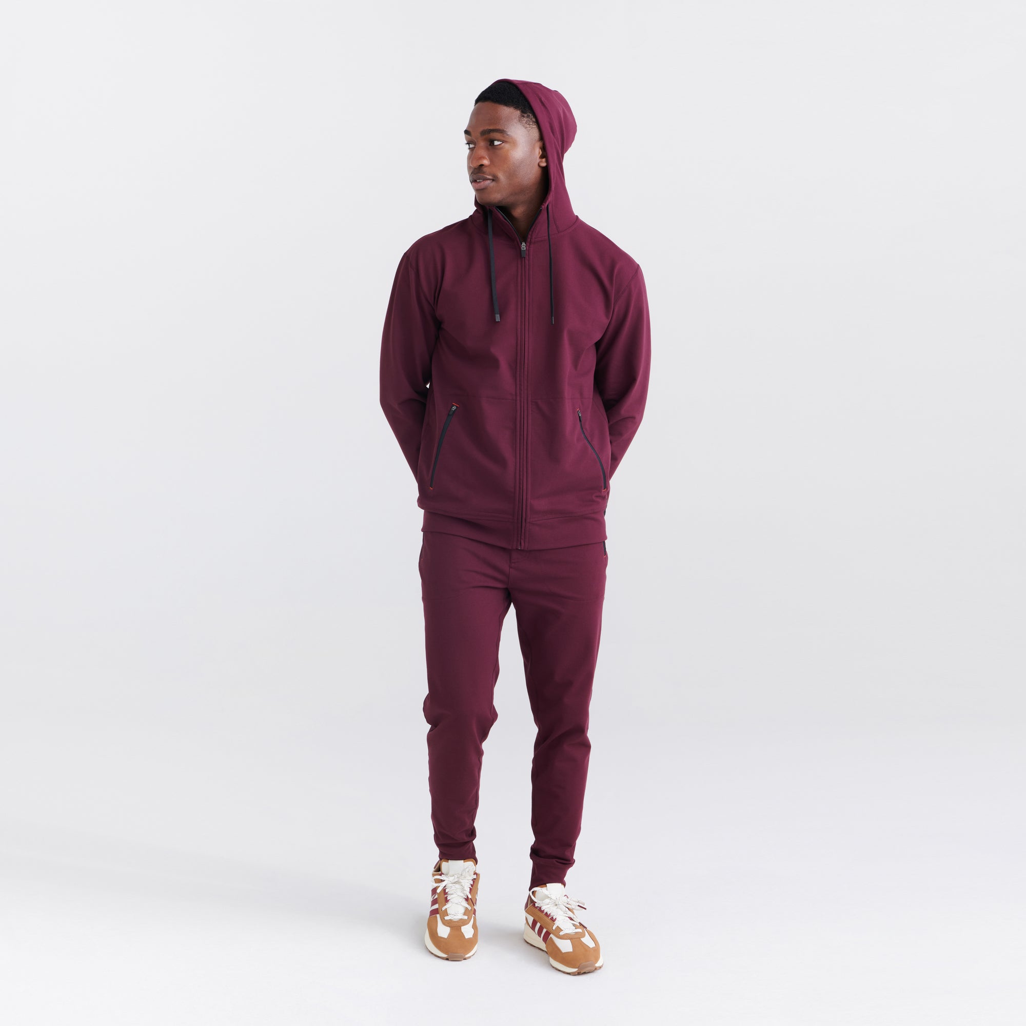 Front - Model wearing Trailzer Pant in Burnt Plum